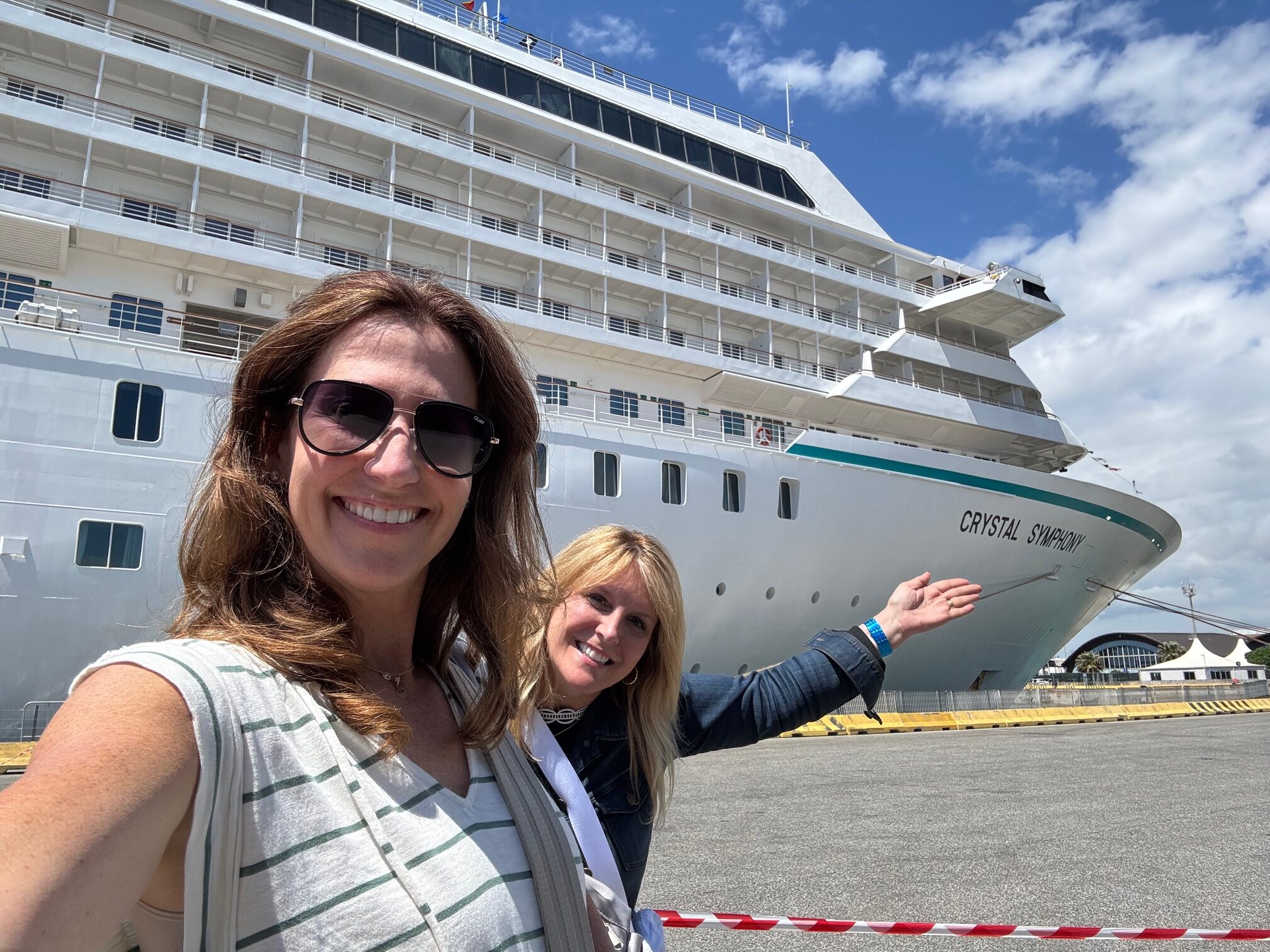 NXL Staff in front of Crystal Cruises