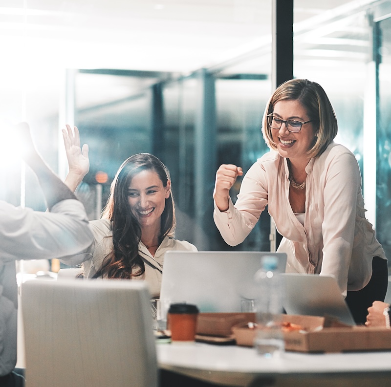 Colleagues cheering together