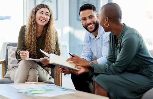 Colleagues connect around a table