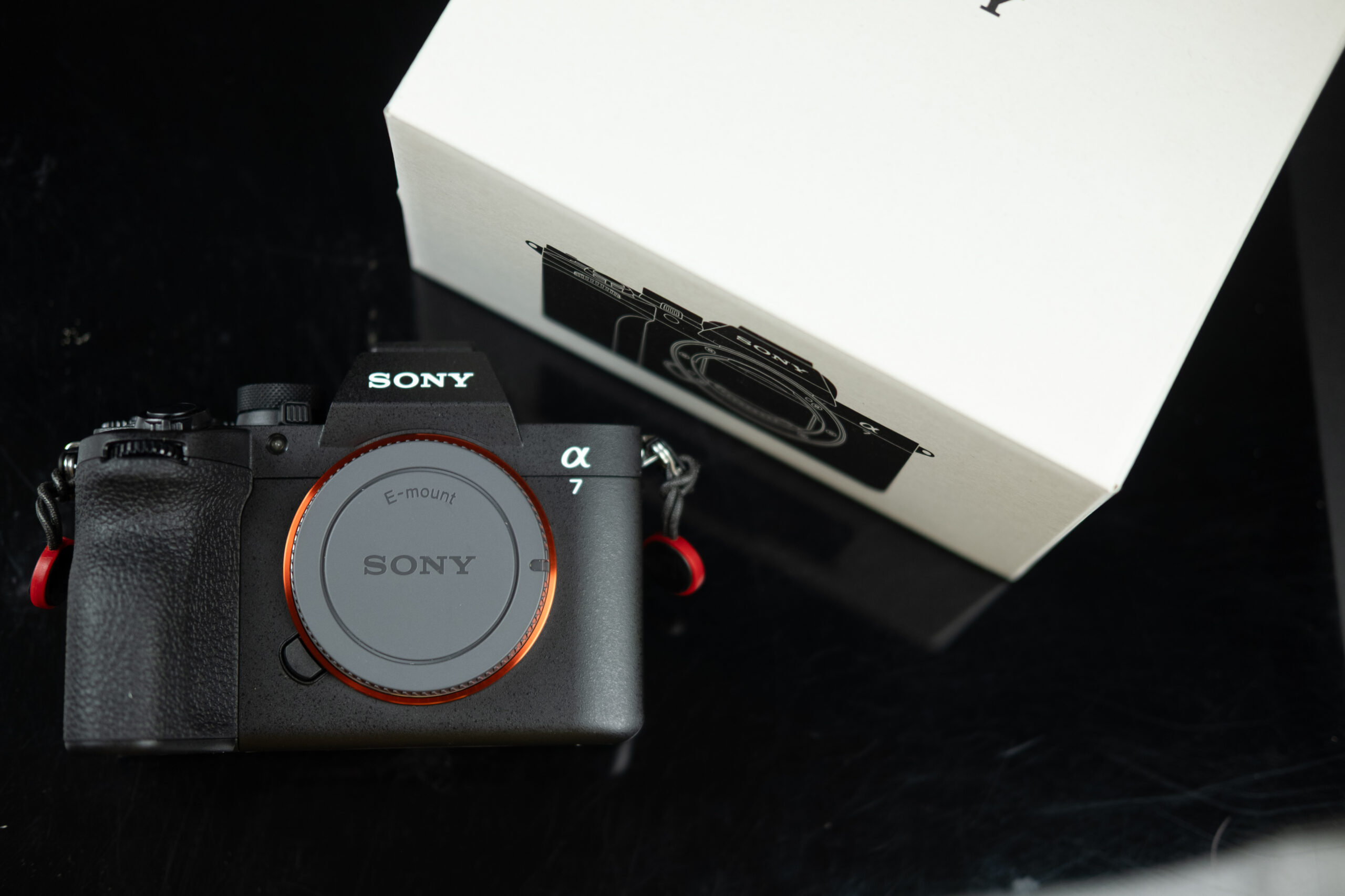 Mirrorless camera beside its box